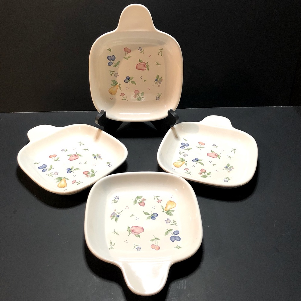 Set of Four Corning Ware Grab it style snack plates.